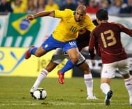 FOXBORO, MA - JUNE 6:  Gerzon Chacon #13 of Venezuela battles Adriano #10 of Brazil during a friendly exhibition soccer match at Gillette Stadium on June 6, 2008,  in Foxboro, Massachusetts.  (Photo by Jim Rogash/Getty Images) ***Gerzon Chacon, Adriano